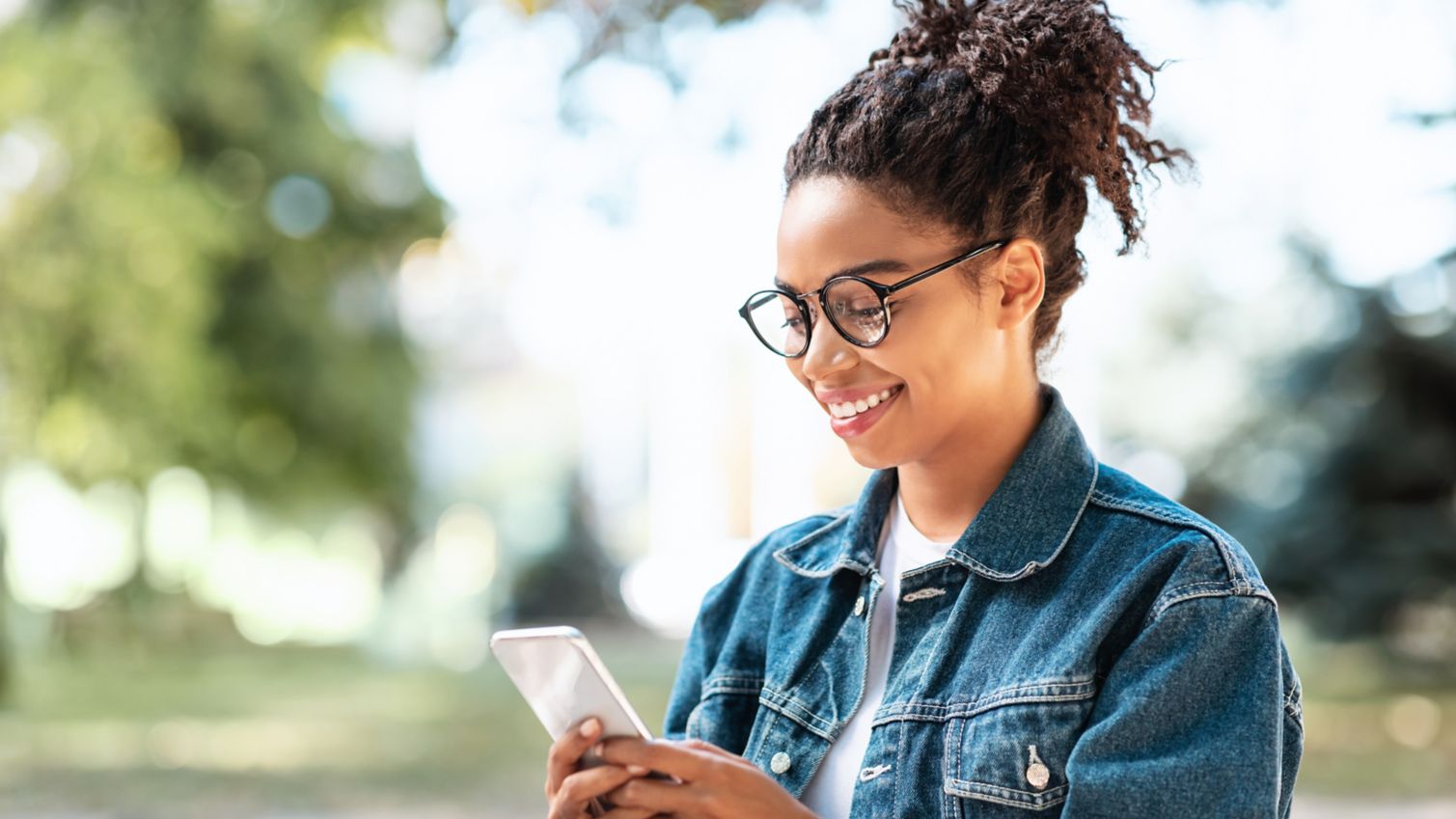 Adult smiling on cellphone
